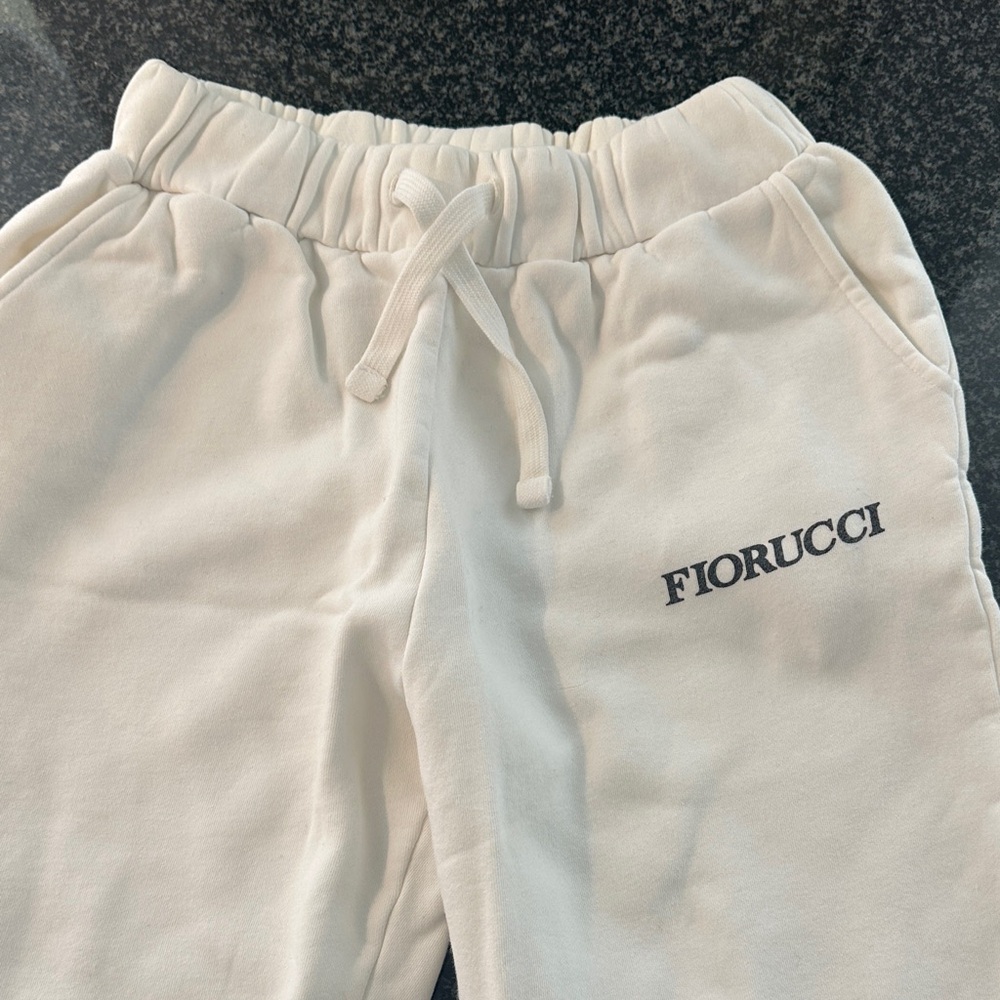 Fiorucci Cream Sweatpants Size Small. Angels Print on Back Right Hip.